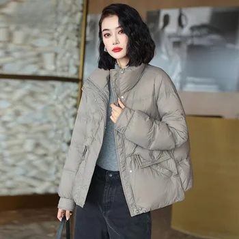2023 Téli új álló gallér rövid kabát Női könnyű divat alkalmi laza 90 kabát