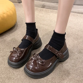 Női brit stílusú bőrcipők 2023 tavaszi fekete muffin diákcipő Retro csokorcsomó díszíti a loafer női cipőt