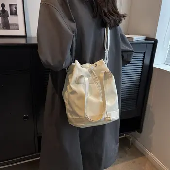 Új húzózsinóros nylon vászon vödör táska női divat egyszerű könnyű kézitáska nagy kapacitású válltáska crossbody táska